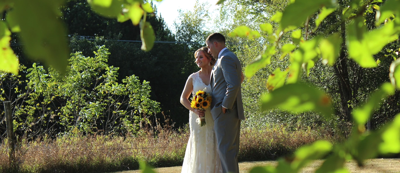 john-Jill 1280x555 Bride and Groom pose near the trees at the wedding event venue, The Barn 1893 Hampshire, IL